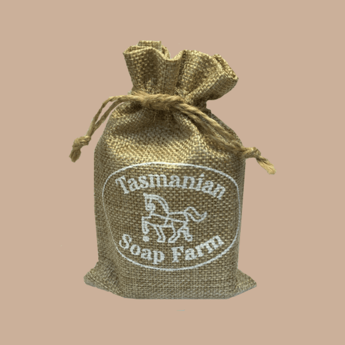 A small natural burlap drawstring pouch with a white embroidered Tasmanian Soap Farm logo, set against a solid beige background.