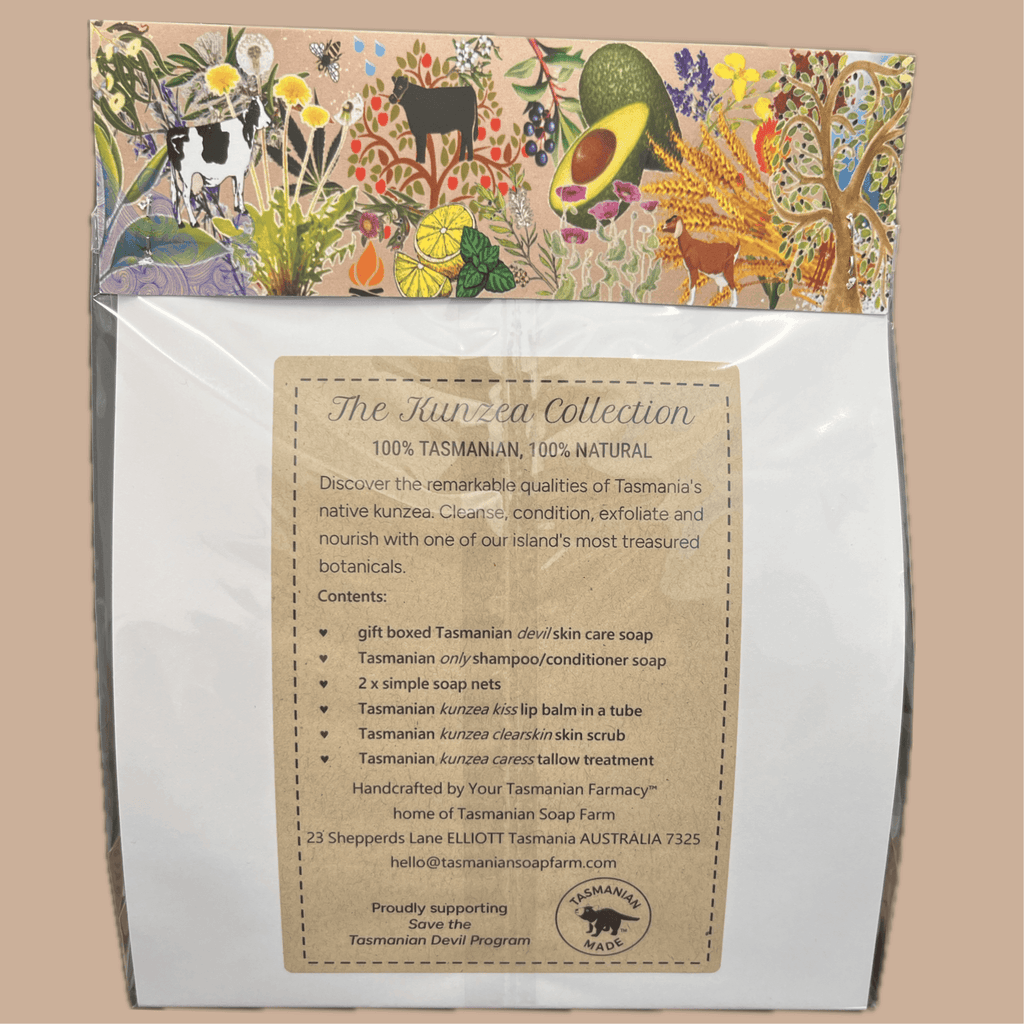 A packaged skin care gift set , The Kunzea Collection, from Tasmanian Soap Farm, featuring a white bag with a colourful, detailed botanical and animal illustration on the flap and a central product information label.