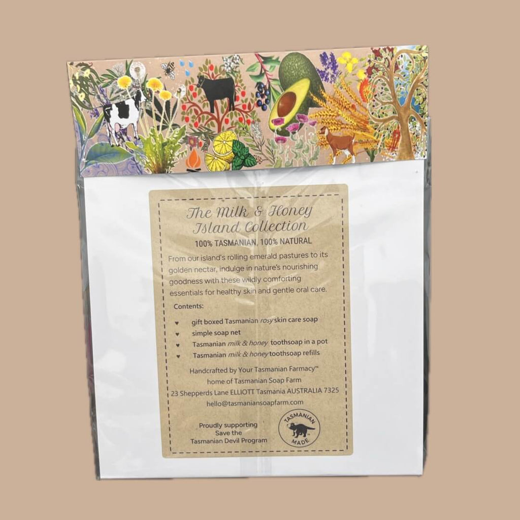 A packaged product labelled 'The Milk & Honey Island Collection' with a colourful illustrated header and a large product information card on a white backing, shown against a plain buff background.