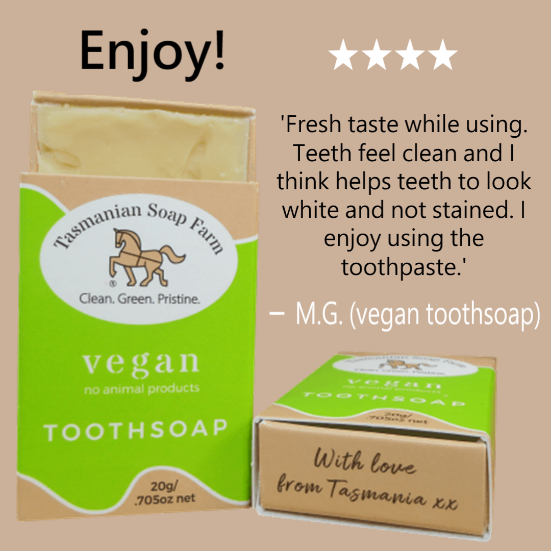 Tasmanian Soap Farm vegan toothsoap boxes shown on a beige background, with one open box revealing pale yellow toothsoap, one closed box in front, and a customer review quote with stars at the top.